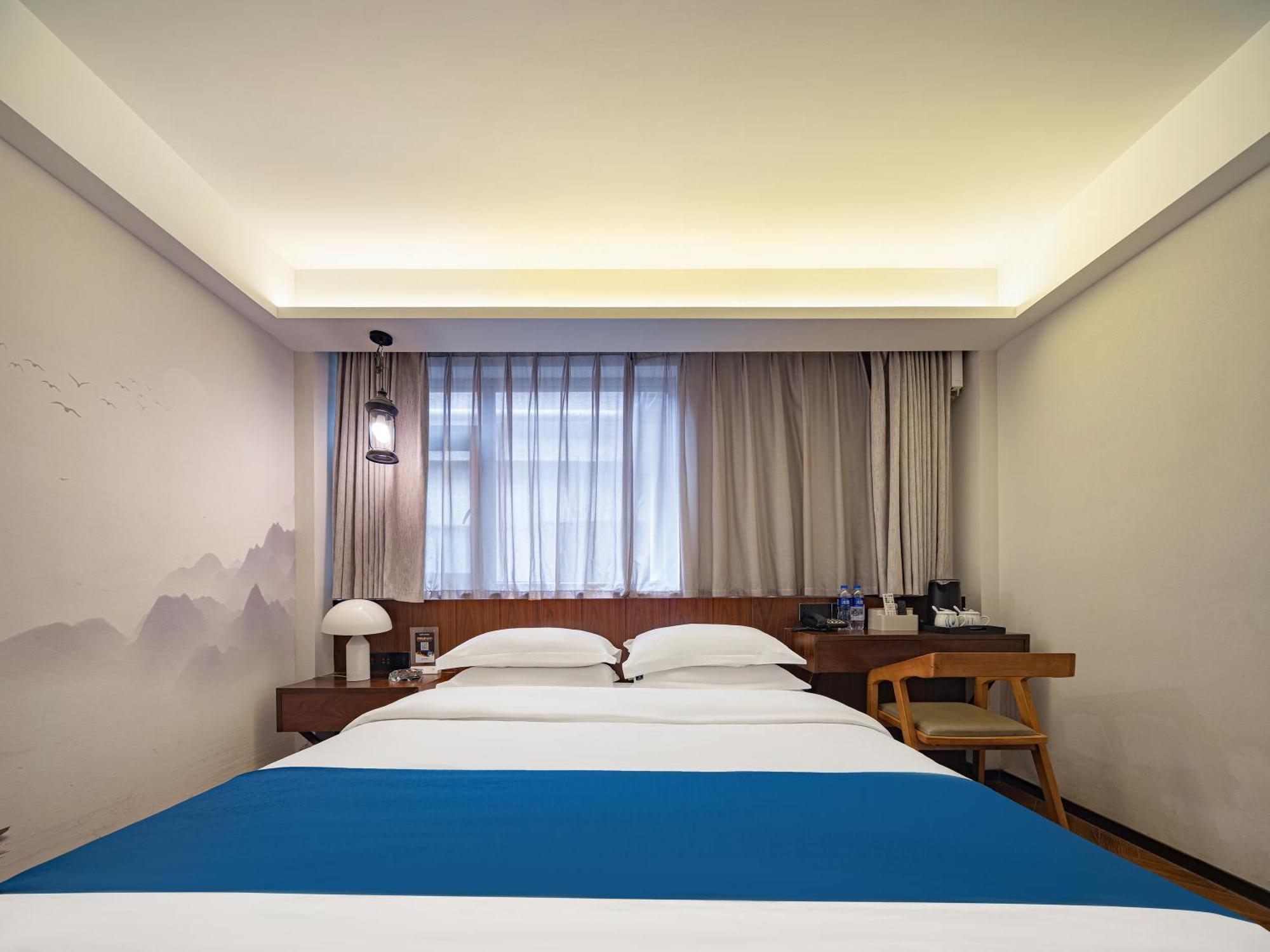 張家界武陵源北岸輕奢客棧 森林公園店 Hotel Zhangjiajie Exterior foto