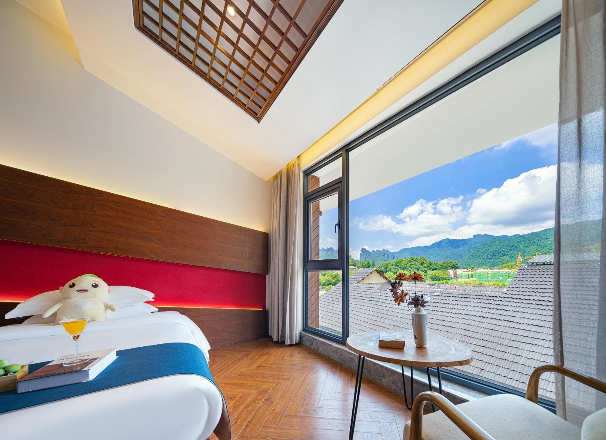 張家界武陵源北岸輕奢客棧 森林公園店 Hotel Zhangjiajie Exterior foto