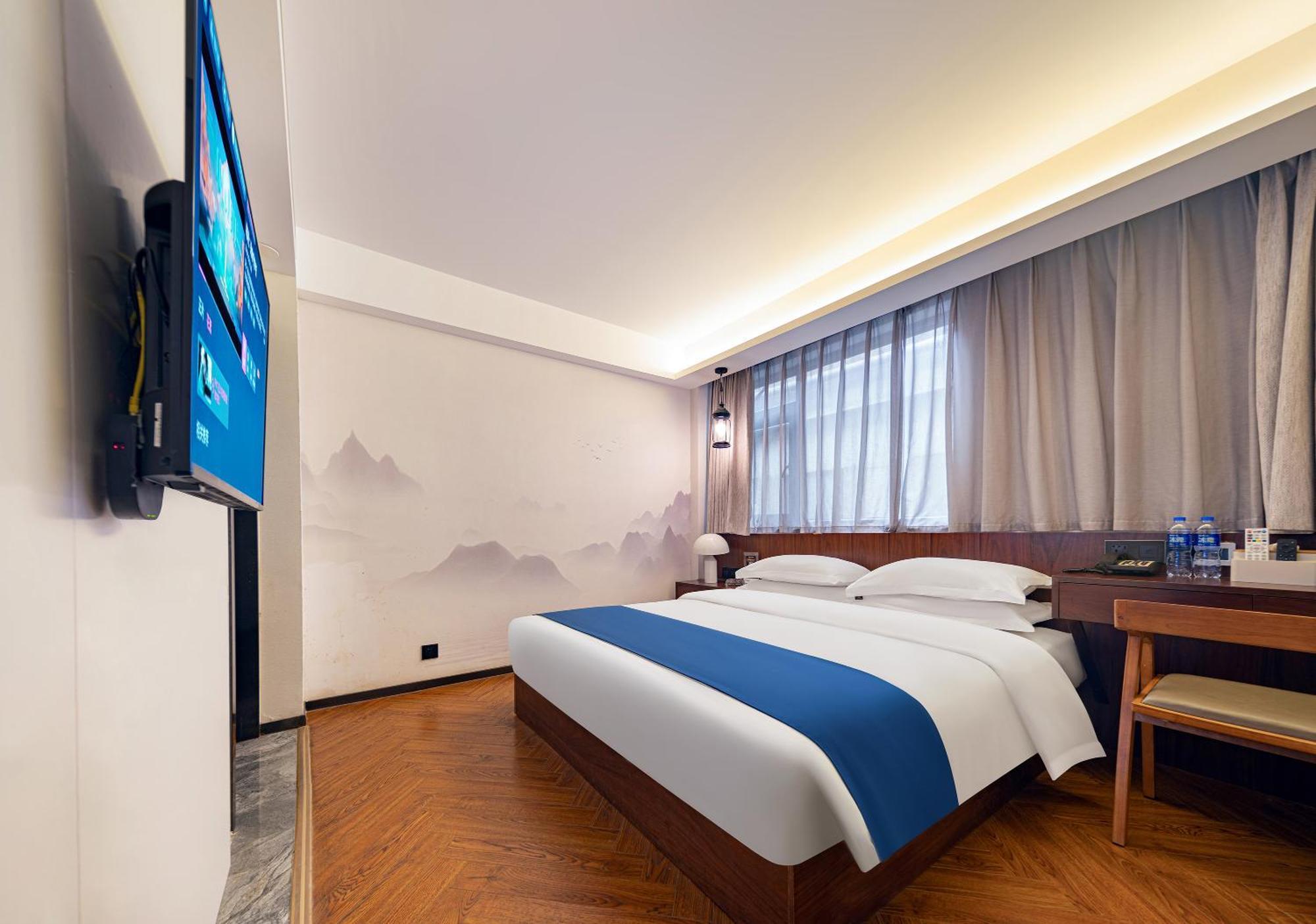 張家界武陵源北岸輕奢客棧 森林公園店 Hotel Zhangjiajie Exterior foto