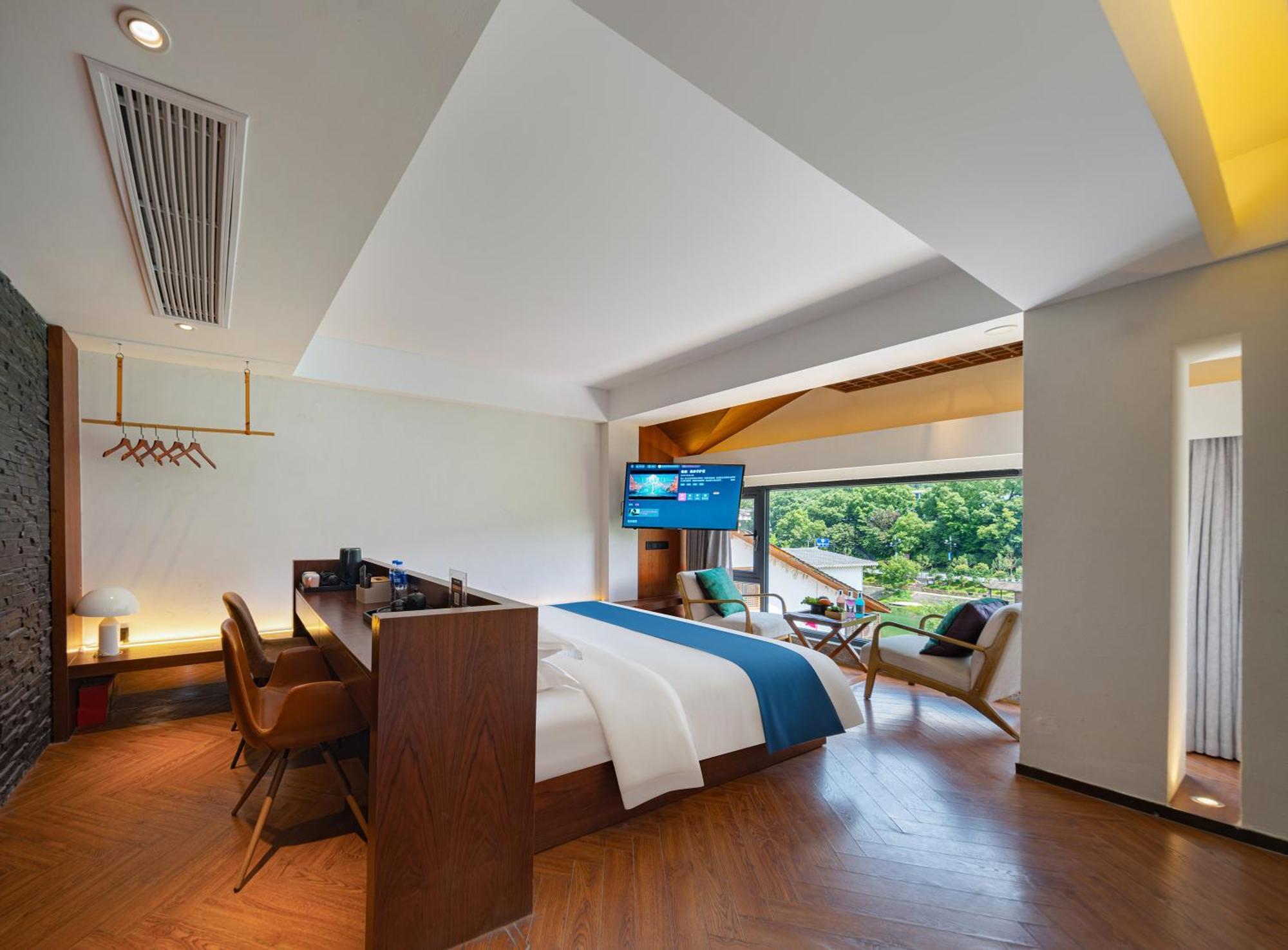 張家界武陵源北岸輕奢客棧 森林公園店 Hotel Zhangjiajie Exterior foto