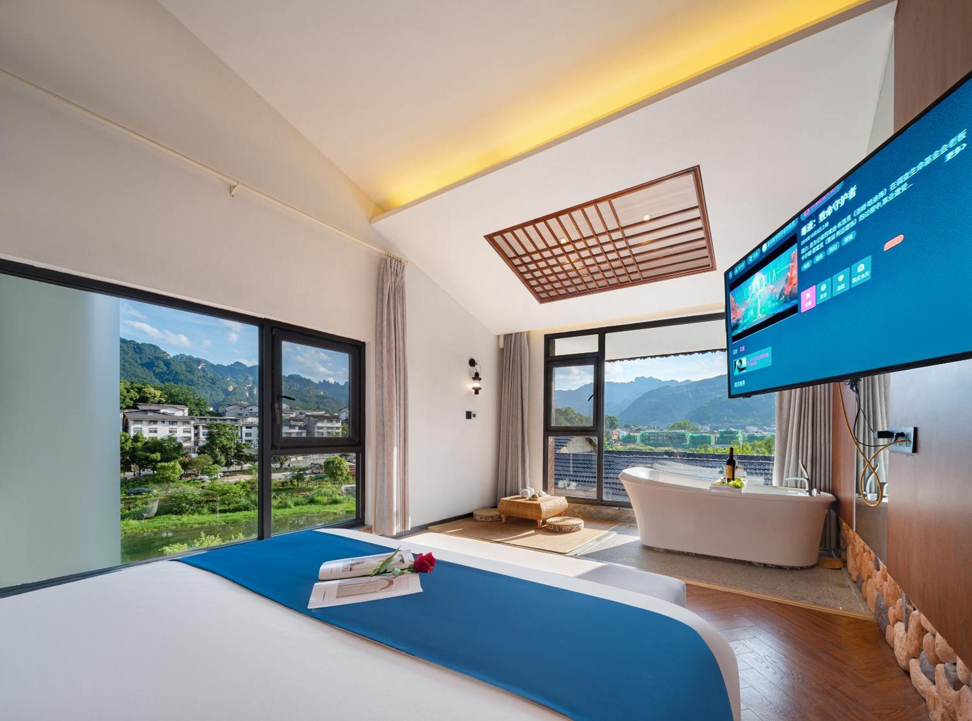 張家界武陵源北岸輕奢客棧 森林公園店 Hotel Zhangjiajie Exterior foto