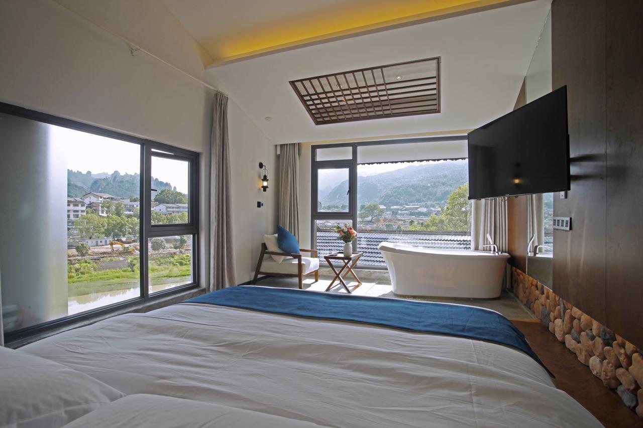 張家界武陵源北岸輕奢客棧 森林公園店 Hotel Zhangjiajie Exterior foto